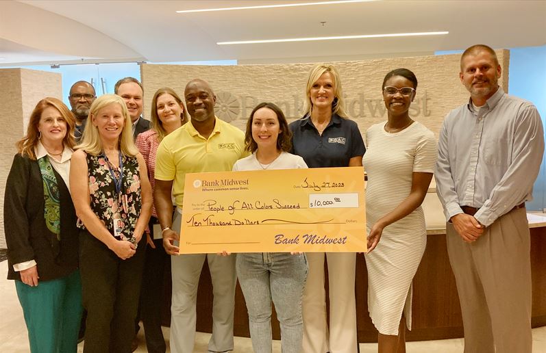 Bank Midwest makes a donation to People of All Colors Succeed